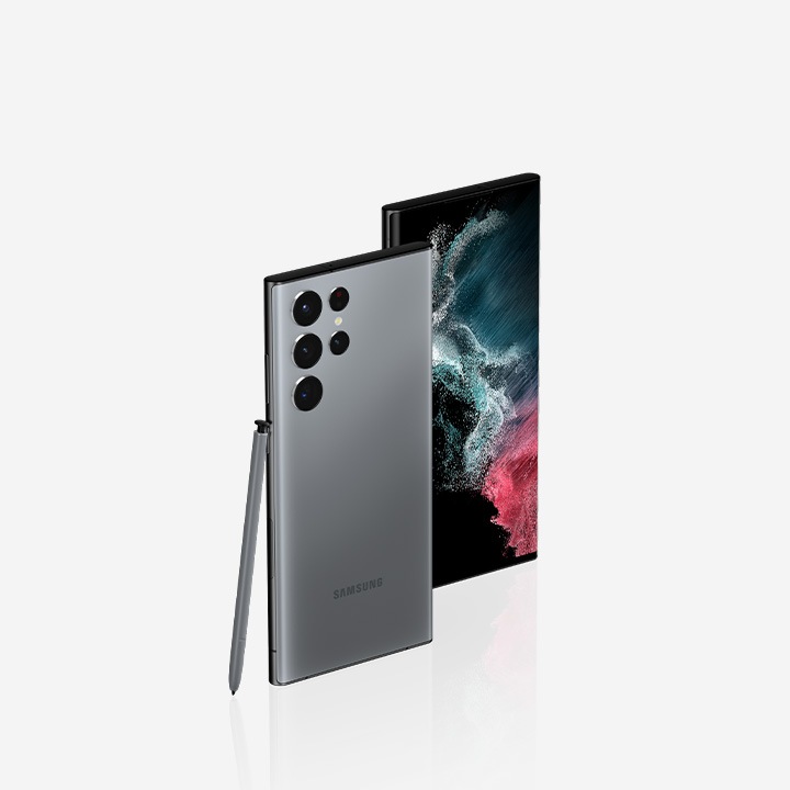 Stunning meets exclusive,Only available at Samsung.com. Two Galaxy S22 Ultra Graphite stand diagonally. The S Pen leans against the device with the rear view showing the front, and the device with the front screen is overlapped behind it.