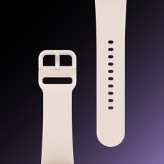 An image of a rose gold Galaxy Watch5 watch band, laid flat showing the detail and design of the band.