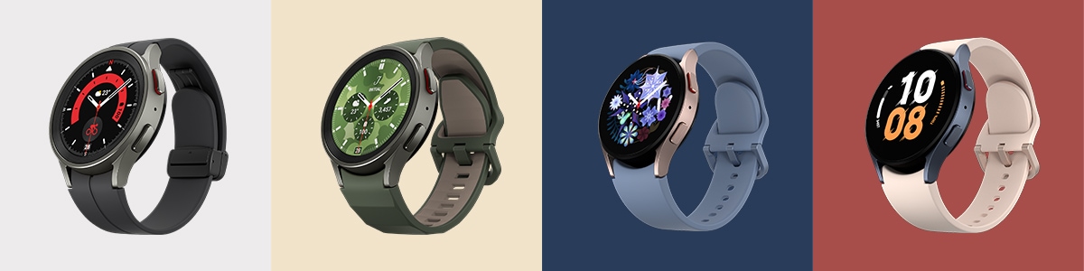 Four Galaxy Watch5 devices are grouped together, with each watch prominently showing different color of band and watch face styles to tell the time.