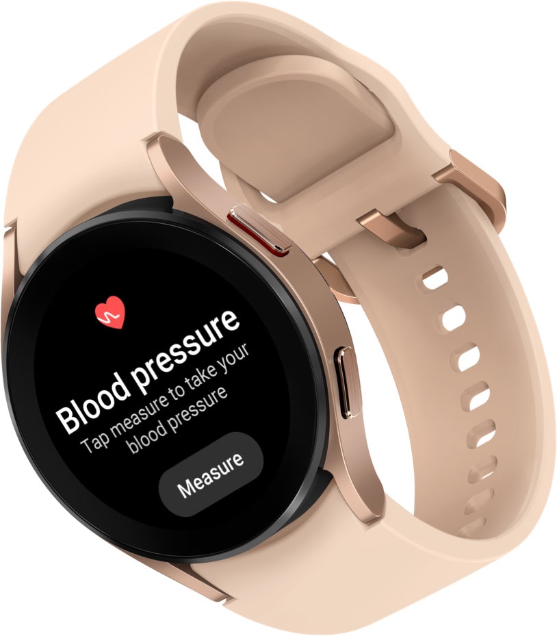 Se muestra un dispositivo Galaxy Watch4 en color oro rosado con una banda rosa. En la esfera del reloj, se muestra el menú para las funciones de medición de presión arterial y ECG.