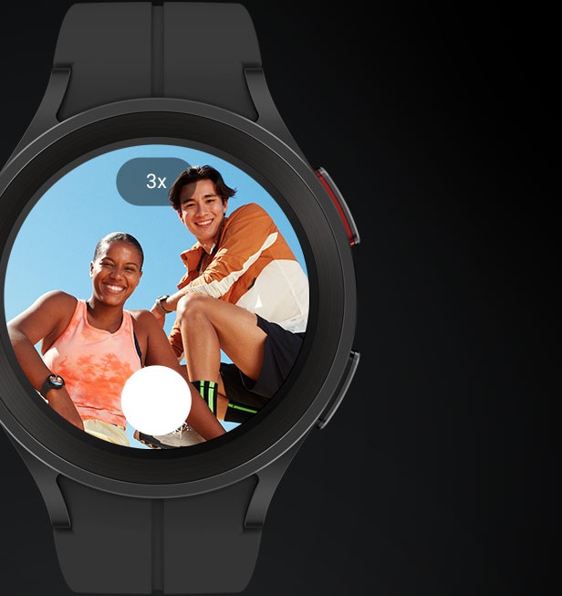 A Galaxy Watch5 Pro displaying a selfie preview with 3x zoom and a shutter button on its screen.