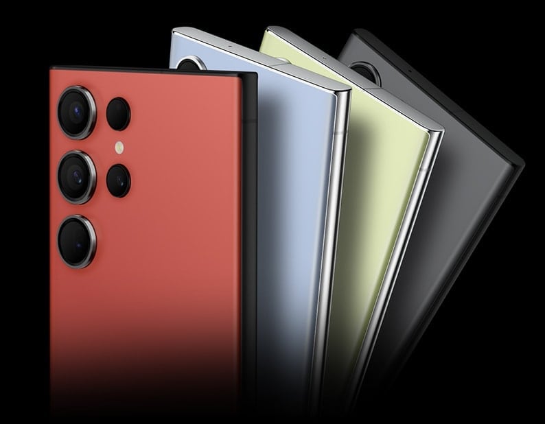 Vista posterior de quatro celulares Galaxy S23 Ultra 5G espalhados, cada um nas cores Vermelha, Azul, Lima e Grafite, exclusivamente on-line.