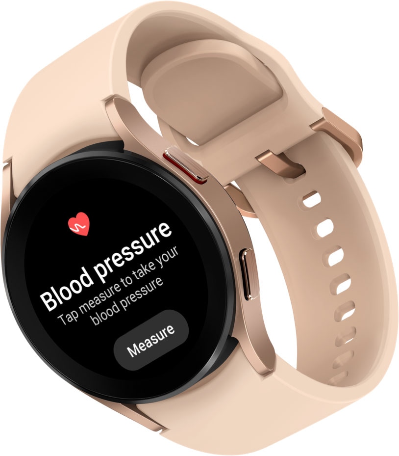 Man sieht eine Galaxy Watch4 in Pink Gold mit pinkem Armband. Auf dem Ziffernblatt wird das Menü für die Blutdruck- und EKG-Messfunktionen angezeigt.