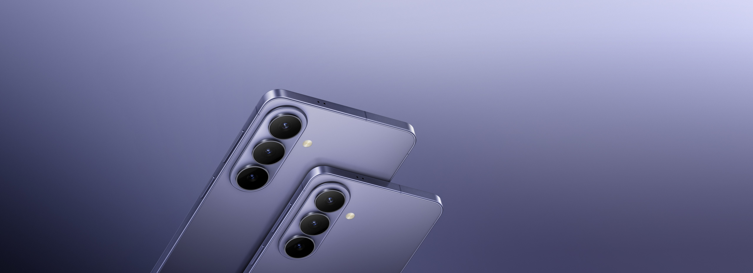 Nærbillede af bagsiden af Galaxy S26 og S26+ ses med fokus på kameralinserne. Galaxy AI.