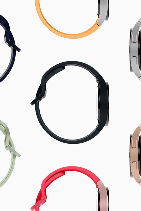 Plusieurs Galaxy Watch 4 de profil sont placées les unes à côté des autres formant un motif. Diverses couleurs de montre et de bracelet sont représentées : vert olive, moutarde, bleu marine, rose, rouge et argent.