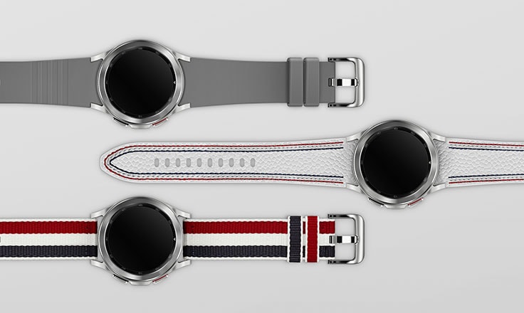 Three Galaxy Watch4 Classic Thom Browne editions are shown. Each watch is laid straight.