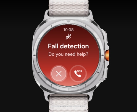 A Galaxy Watch Ultra is displaying Fall detection screen with text Fall detection, Do you need help?. Two buttons are at the bottom: cancel and SOS call.