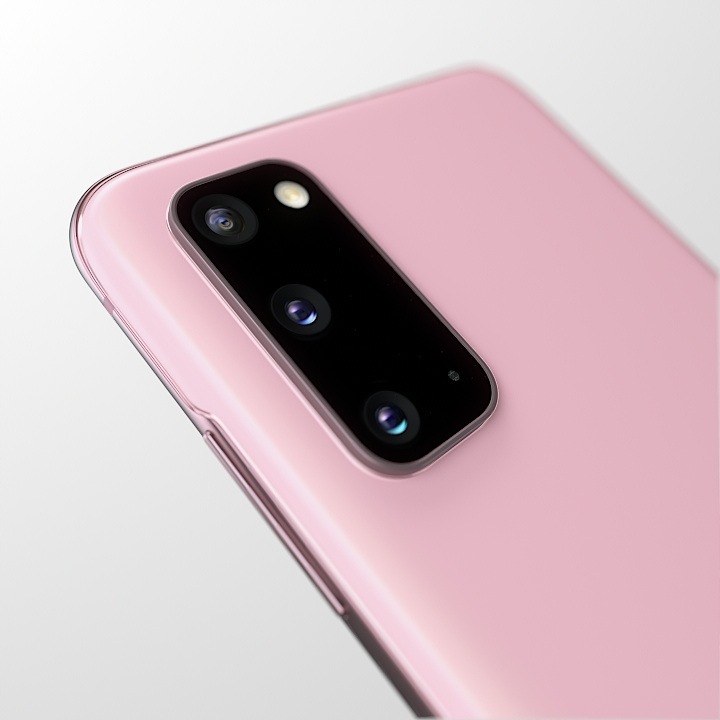 A pink Samsung Galaxy S20 plus is laid on its back and tilted slightly to the left, showing 30x zoom camera with 64 megapixel