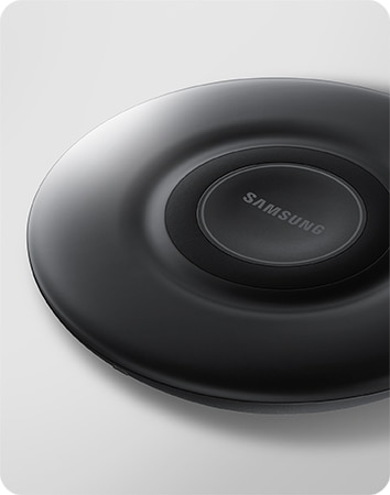 Front of a Black Wireless Charger Pad, tilted slightly to the left. 