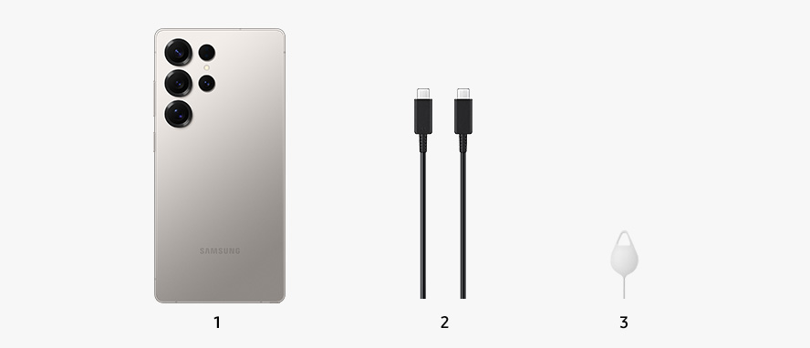 Galaxy S25 Ultra in Titanium Gray is shown from the back with a battery charging cable and an ejection pin next to it.