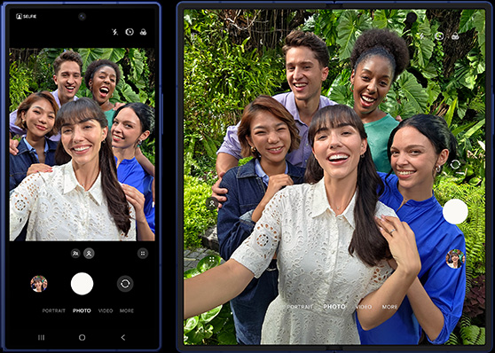 A group selfie is being taken on Galaxy Z Fold7. You can take group selfies with both the cover screen camera and main screen camera, but the wider angle on the main screen camera gives you a better preview of your shot.