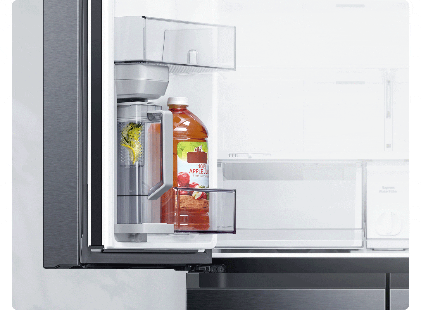 The fridge door is open to show the Autofill Water Pitcher filling with water, and with lemons in the built-in infuser.