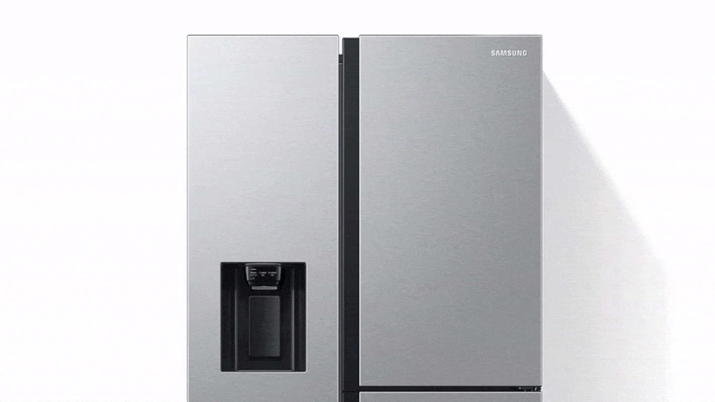 The upper right door of the 2-door fridge opens, and fresh cool air circulates around the compartment.