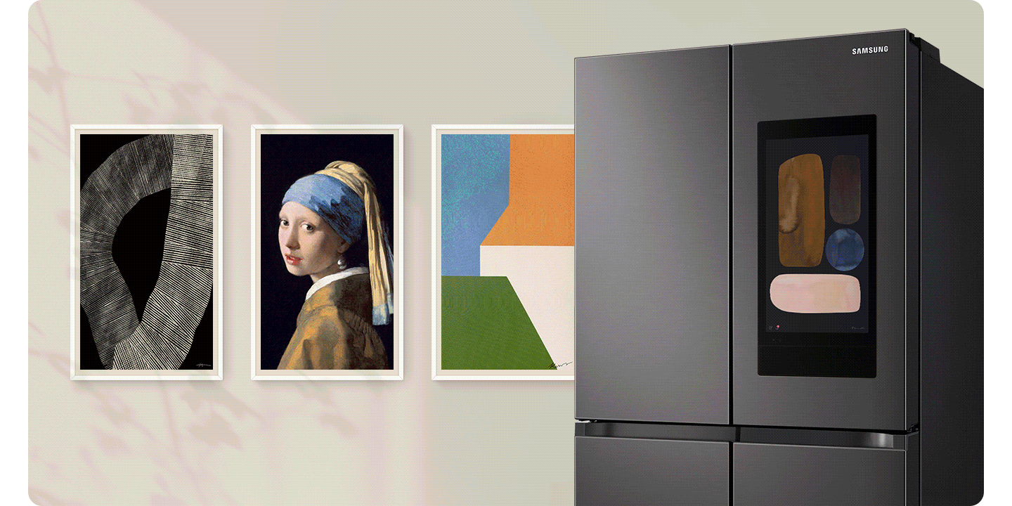 A Steel Black 4-door Family Hub fridge has art on its main display. Next to it, 3 frames on the wall display art that changes.