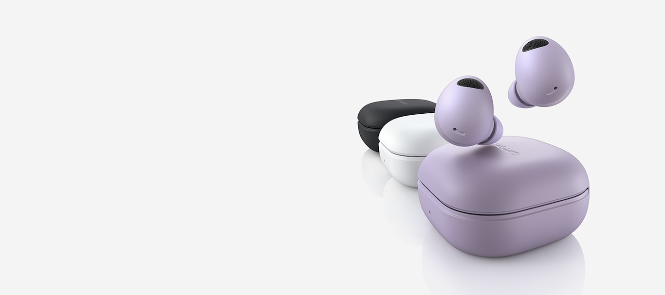 Three Galaxy Buds2 Pro devices lined up. The Bora Purple Galaxy Buds2 Pro device in the front has two buds hovering above the closed case. The middle White closed case is followed by a Graphite closed Buds2 Pro case.