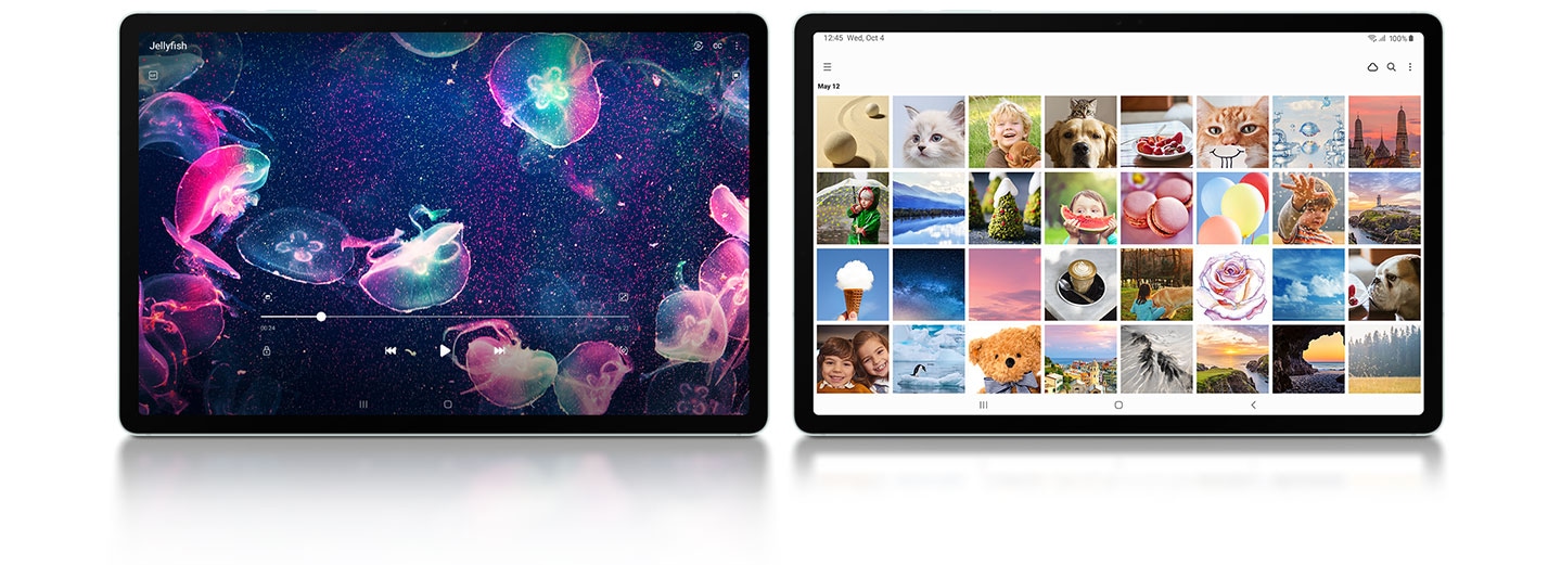 Two Galaxy Tab S9 FE+ devices in Mint placed next to each other in Landscape mode, facing forward. On the left one, a video of colorful jellyfish is playing fullscreen. On the right one, the Samsung Gallery app is open fullscreen.