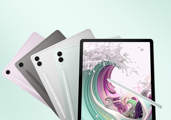 Galaxy Tab S9 FE in Lavender and Gray, Tab S9 FE+ in Silver and Mint are lined up overlapping each other with their back facing forward and S Pen attached. An S Pen is pointing at the screen of a Mint-colored Galaxy Tab S9 FE+ with a colorful wave wallpaper onscreen.