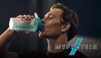 A man is seen driving a protein shake