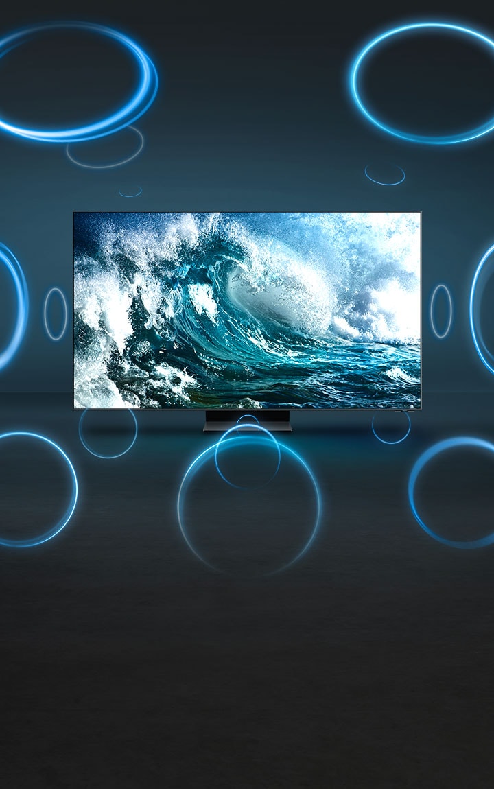 Auf dem Fernsehgerät wird eine Nahaufnahme von kräftigen, rauschenden Wellen angezeigt. Blaue Kreise um den Fernseher herum veranschaulichen den satten und beeindruckenden Klang.