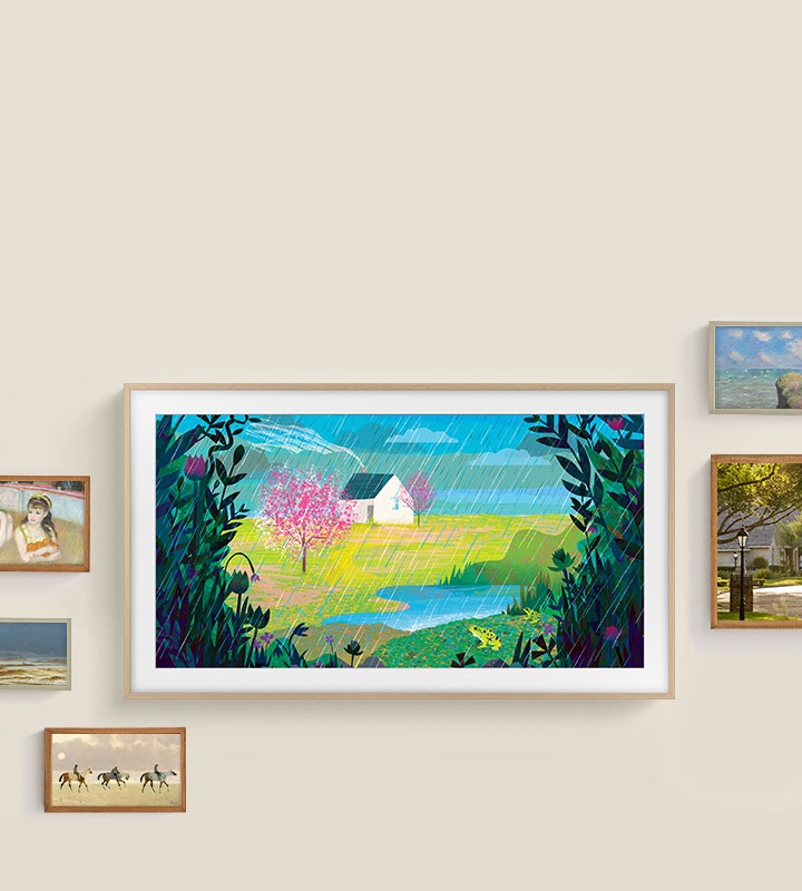 The Frame fixé au mur s'intègre parfaitement aux autres tableaux plus petits accrochés autour de lui.