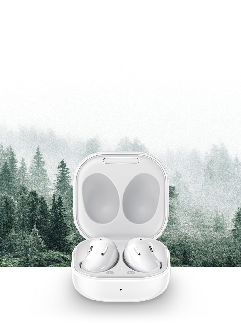 Galaxy Buds Live seen in open case in front of a forest.