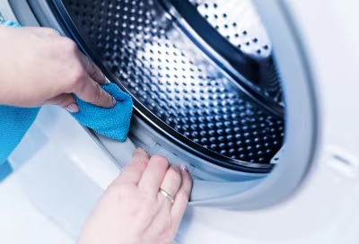 Bien nettoyer la laveuse à chargement par le dessus