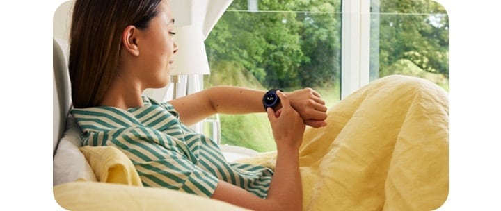 Woman checking her Samsung Galaxy Watch