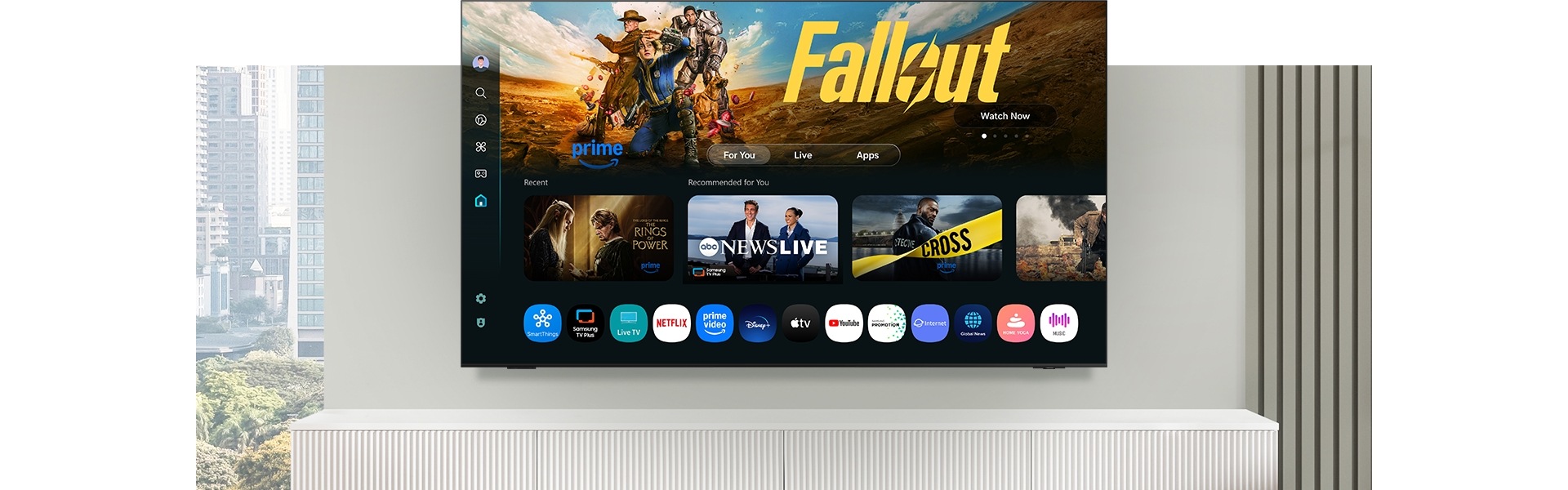 A TV displays a One UI Tizen screen with options to stream free TV and various apps and services like Samsung TV Plus.