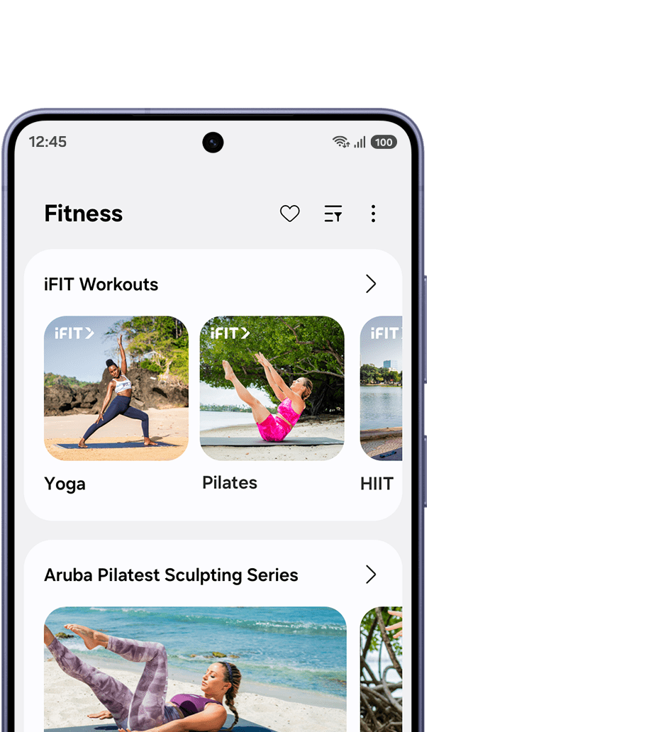 Galaxy S26 con iFIT en pantalla, que muestra diversos entrenamientos guiados, incluidos pilates, HIIT y Sculpting Series.