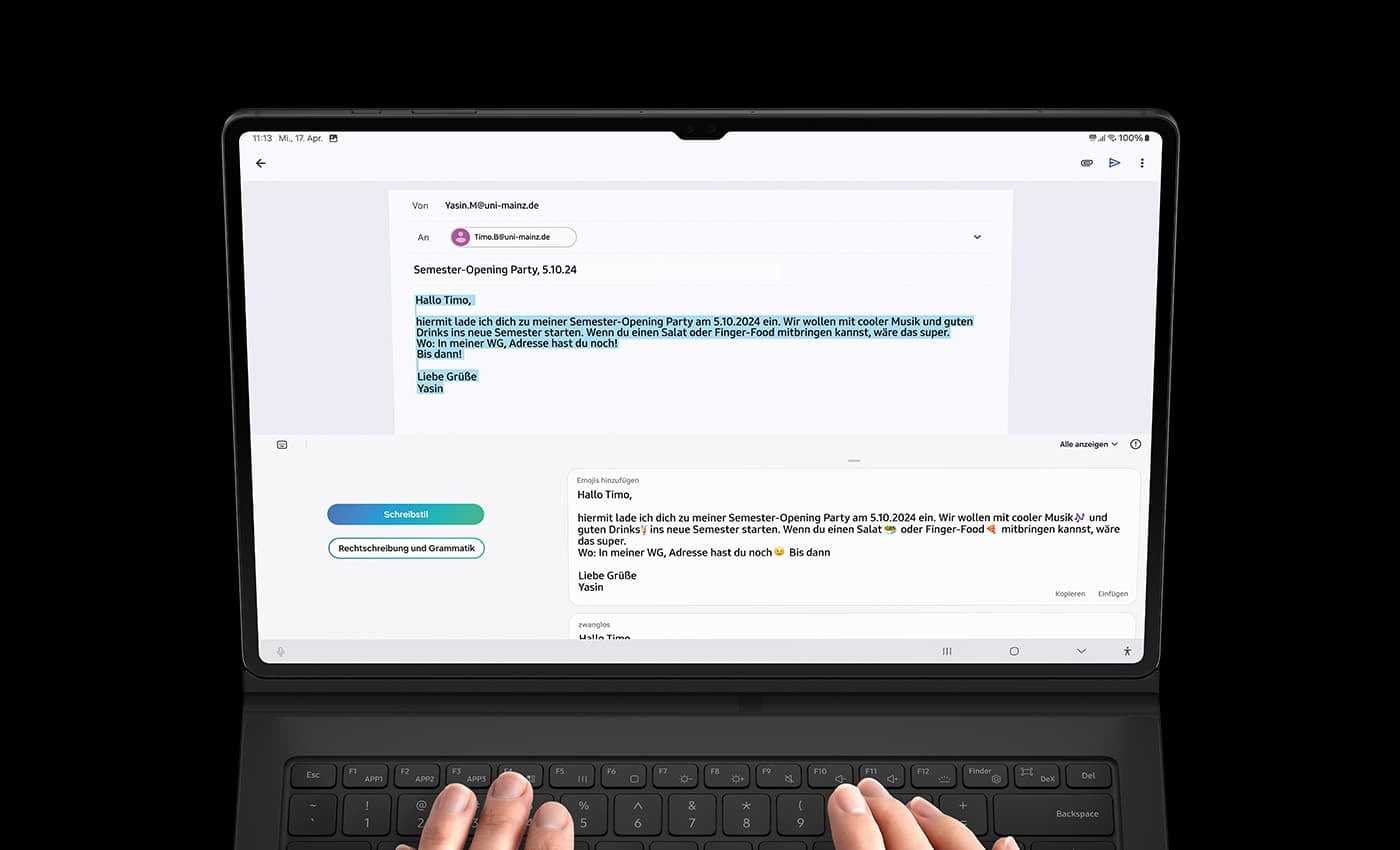 Galaxy Tab S9+ in Landscape mode with the Photo Editor app open, showing an image of two astronauts floating in space. The original image of the astronaut on the left has been selected and moved to the middle of the screen using the Photo Assist feature.