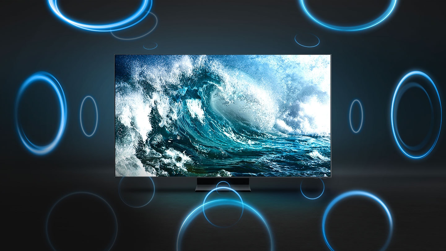 Auf dem Fernsehgerät wird eine Nahaufnahme von kräftigen, rauschenden Wellen angezeigt. Blaue Kreise um den Fernseher herum veranschaulichen den satten und beeindruckenden Klang.