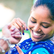 An photo image of a woman dancing with a smile