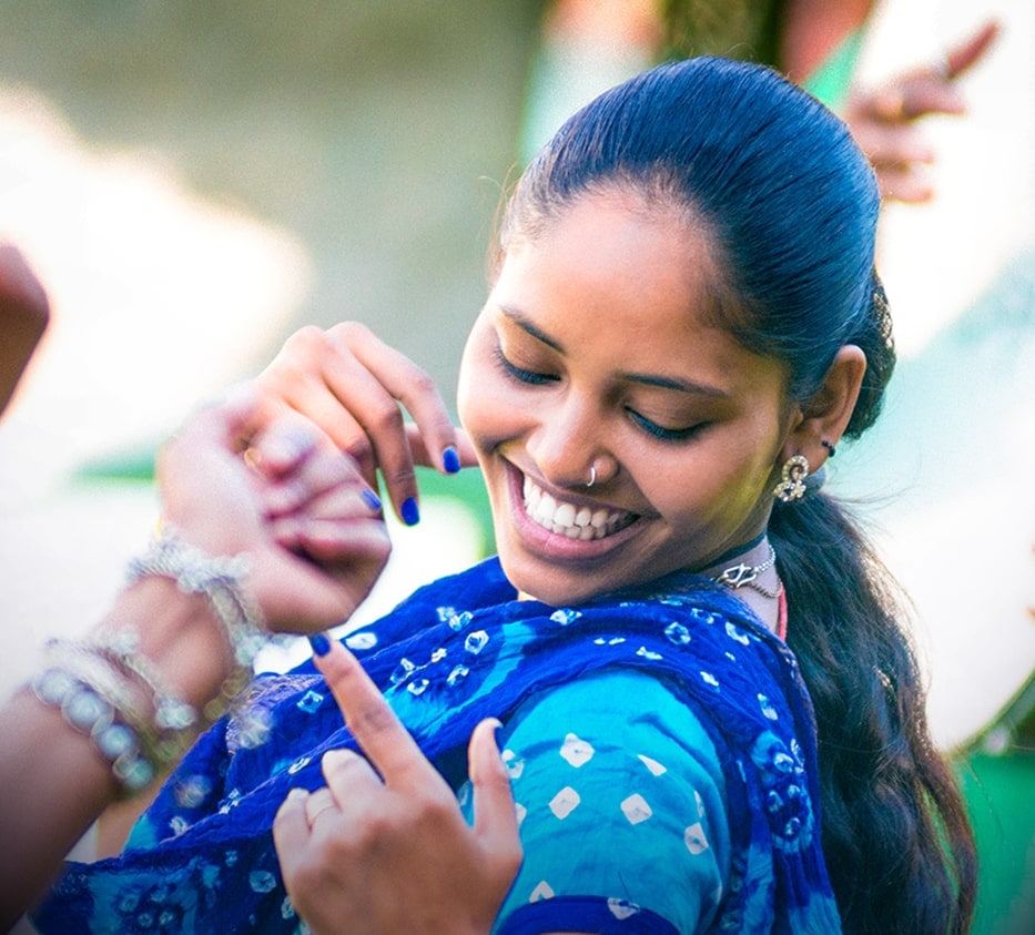 An photo image of a woman dancing with a smile