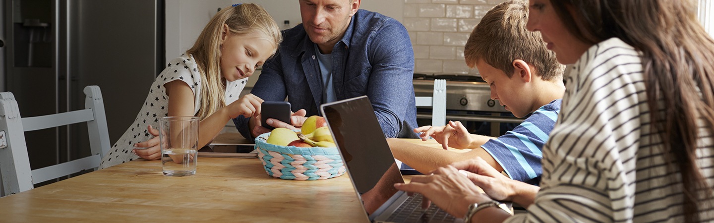 A photo of a family using the 5G wireless internet service at home illustrates the use case of fixed wireless access.