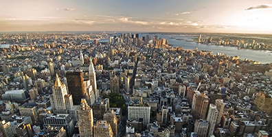 An image of a city with dense buildings taken from above.