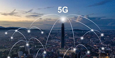 An illustrative image of multiple buildings connected by 5G network.