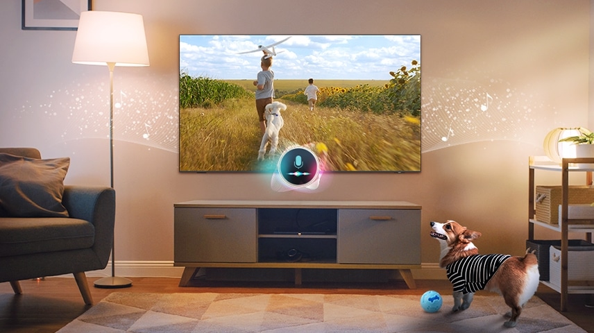 A TV's connected mic detects a dog's presence. The dog looks happy as the TV plays a peaceful scene along with music.