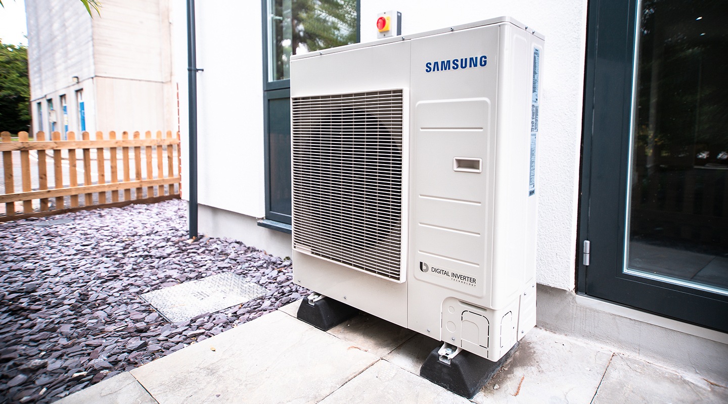 An installed EHS unit in front of a home.