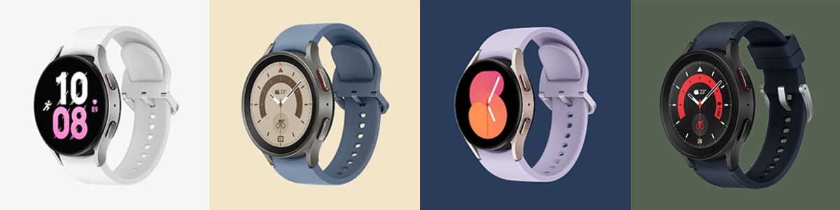 Four Galaxy Watch5 devices are grouped together, with each watch prominently showing different color of band and watch face styles to tell the time.