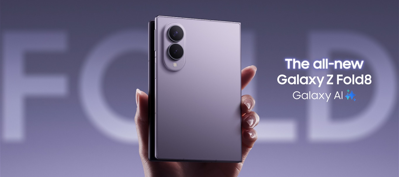 A hand holds a Galaxy Z Fold8 Ultra in Violet Shadow, which can be seen from the back with the rear cameras visible. Another hand nearby holds a Galaxy Z Fold8 in Lavender, which can be seen from the back with the rear cameras visible. Galaxy AI. The all-new Galaxy Z Fold8 Ultra and Fold8.