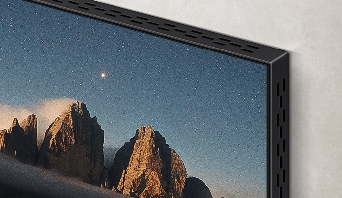 A close-up on a corner of a TV with Infinity Screen, which has a minimalist look with a thin reduced frame.