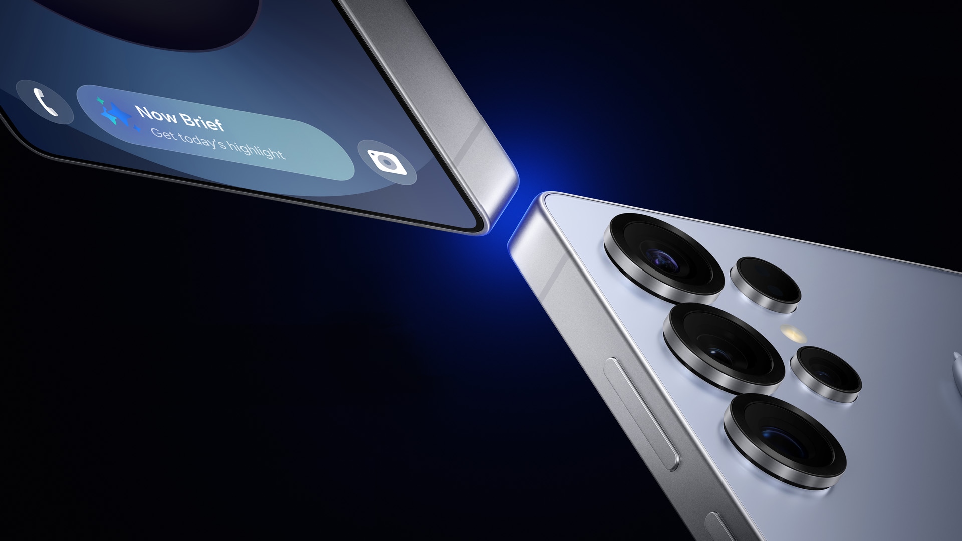 Close up of two Galaxy S25 Ultra devices in Titanium Silverblue. One is seen from the rear with a close up of the camera lenses with an S Pen on top of it. The other displays a notification from Now Brief with the words 'Get today's highlight' on the bottom of the screen.