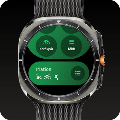 EEgy Galaxy Watch Ultra megjeleníti az edzéskövetés funkciót. A tetején az órának látható egy bicikli ikon a bicikli szöveggel és a menü ikon a több szöveggel. Középen a triatlon szöveg látható és az úszás, biciklizés és futás ikon alatta. A jobb oldalon a menü ikon látható. Alul a 380 strandút, bicikli ikon, 34,5 km és a menü ikon látható.
