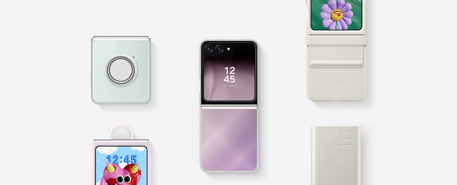 A flat lay of accessories for Galaxy Z Flip5: a battery pack, Galaxy Z Flip5 with the Clear Gadget Case installed, Galaxy Z Flip5 with the Silicone Case with Ring in Lavender installed, Galaxy Z Flip5 with the Flap Eco-Leather Case in Cream installed and Galaxy Z Flip5 with the Flipsuit Case installed.