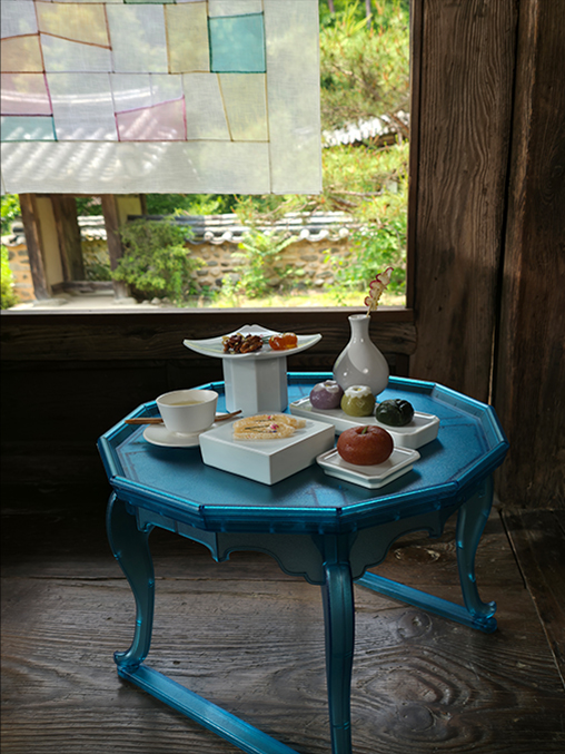 A photo of food arranged on a table indoors has been shot on Galaxy Z Fold7's 200 megapixel rear camera. Colors and details are well-defined.