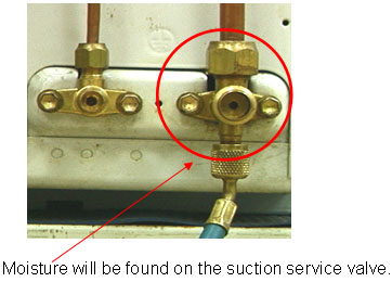 Moisture will be found on the suction service valve.