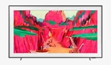Samsung's The Frame TV displays a rocky abstract landscape in bright pink tones.