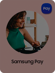 A female in a green halter neck top is shown tapping her device to pay in a shop to show off Samsung Pay.