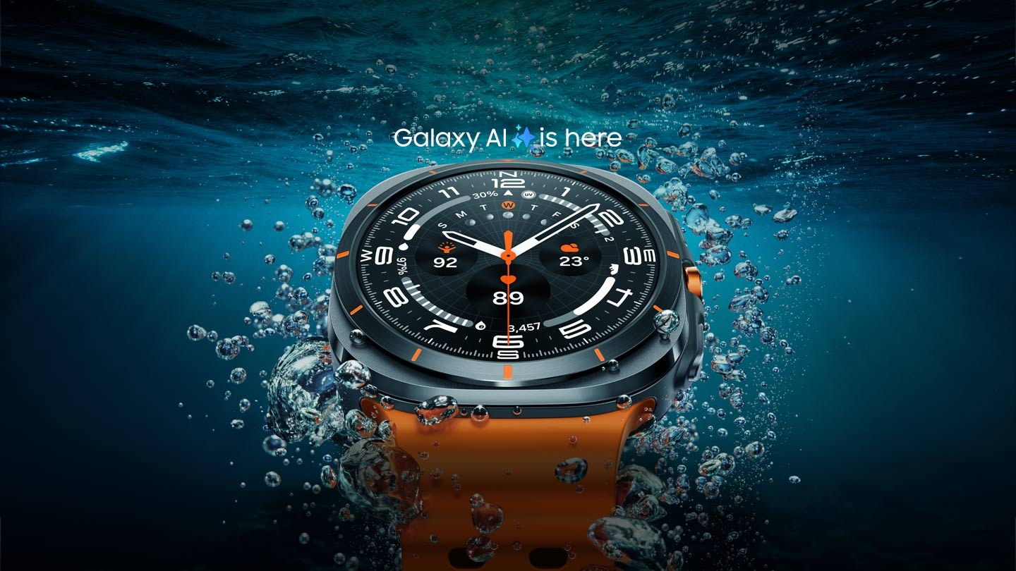 A Galaxy Watch Ultra is seen close-up in the water near the surface, showcasing its design. 'Galaxy AI is here' with a Galaxy AI icon show up above the device.