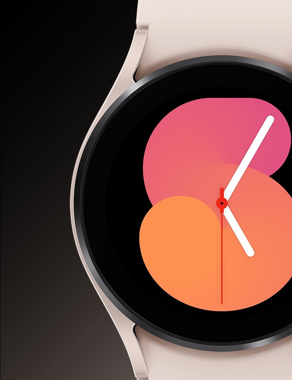 A Pink Gold Galaxy Watch5 device showing its front watch face that has the time '5:05' displayed.